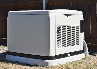Standby home generator set in residential backyard emergency backup power supply