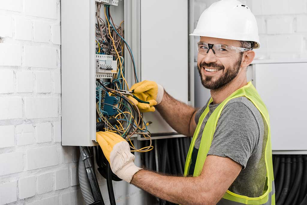 Keep Your Business Powered Without Interruption with electricians holding tools Keep Your Business Powered Without Interruption with electricians holding tools